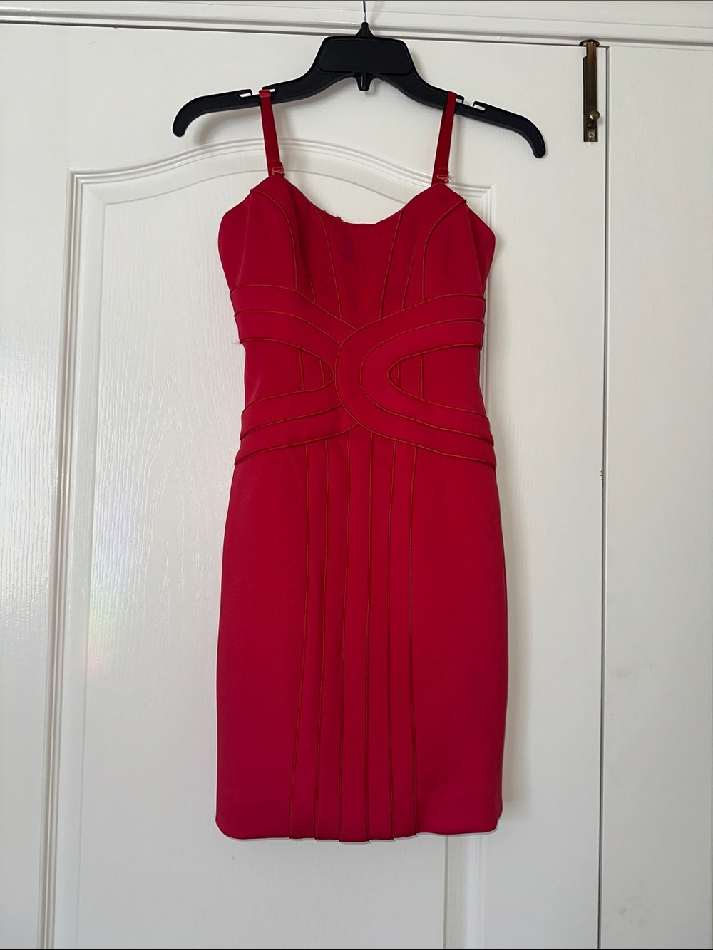 Bebe red dress. Boning in bodice. Scuba like material. Size XS